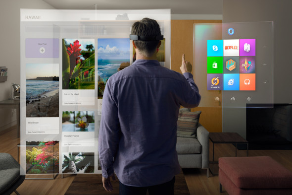 Největší překvapení, které Micosoft úzkostlivě tajil, vyrazilo návštěvníkům tiskové konference dech. Jde o HoloLens, průvodce virtuální realitou, jinak technikou nadupané brýle. (zdroj: Microsoft)